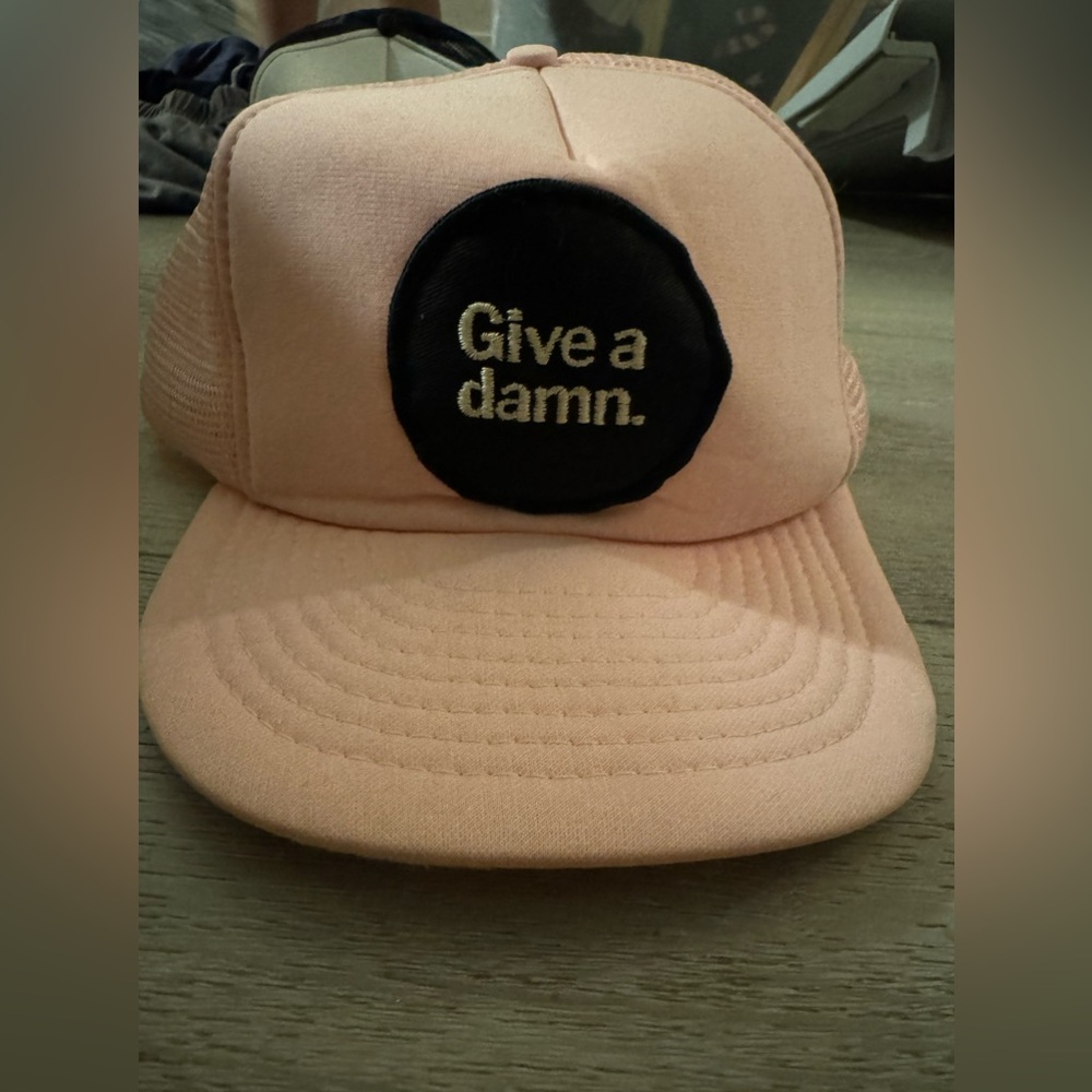 PASTEL PINK TRUCKER HAT GIVE A DAMN